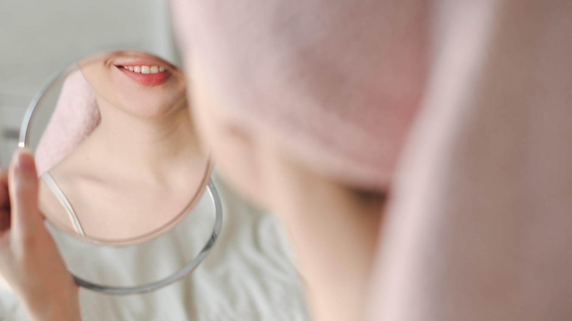 a woman wearing a white shirt